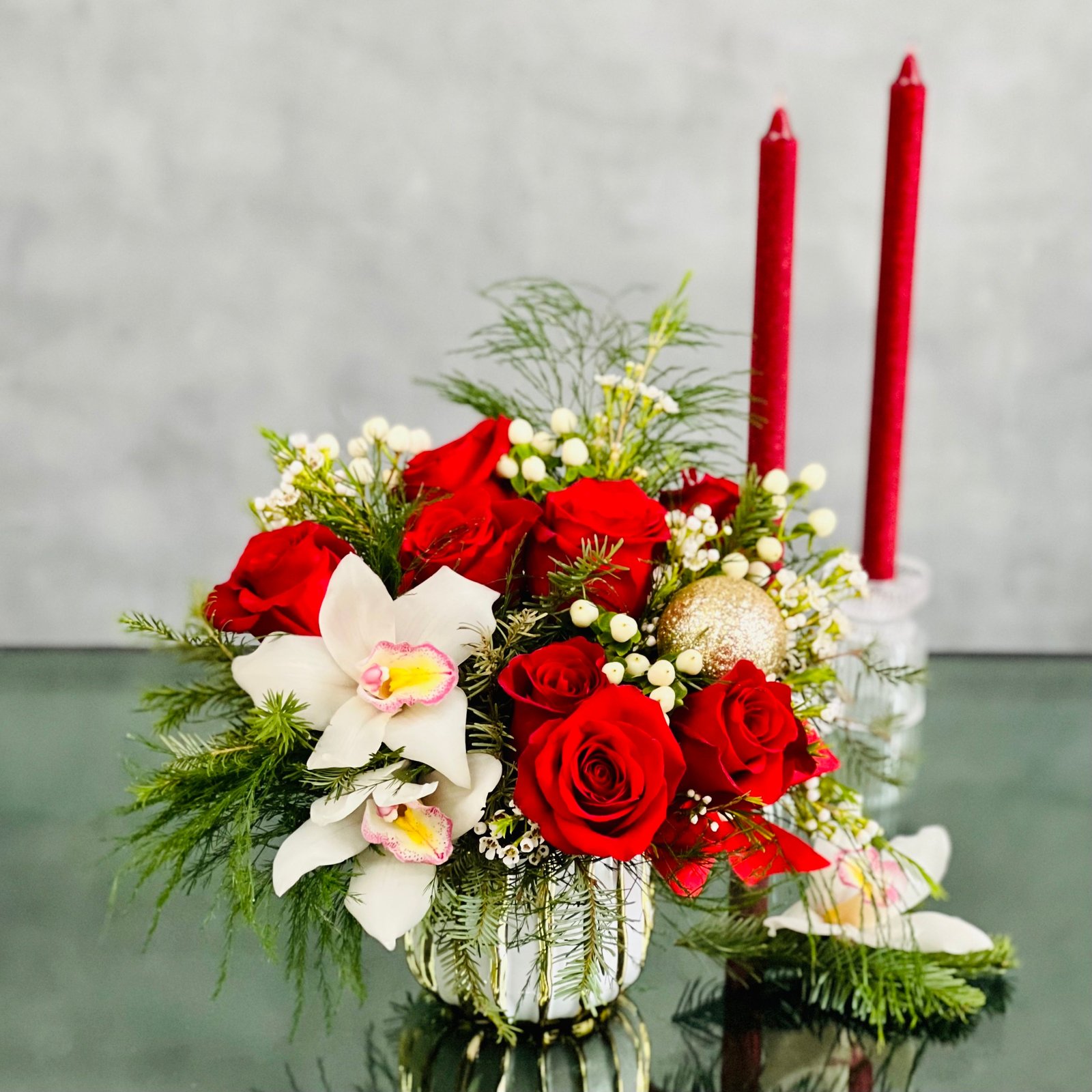 Red_and_White_Holiday_Bowl_-_Same-Day_Delivery_by_Beverly_Hills_Florist1 ed and White Holiday Bowl features roses, orchids, and greens in a gold vase. Same-day Los Angeles flower delivery by Beverly Hills Florist.
